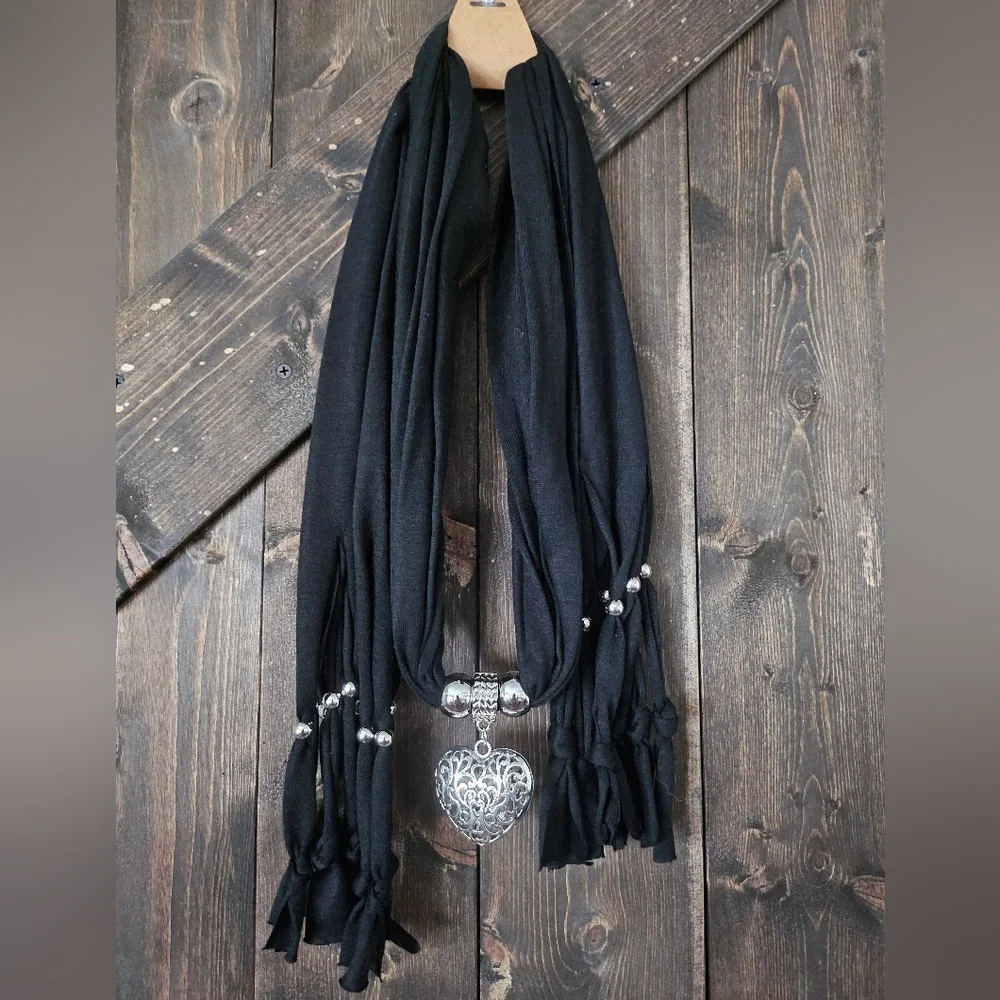 NWT Chic Black and Silver Wrap with Intricate Medallion